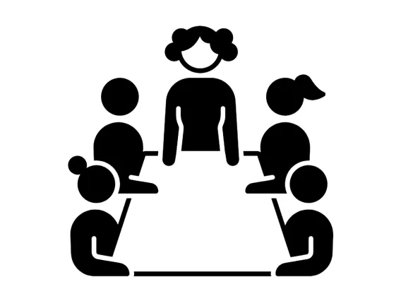 this icon is silhouettes of the upper bodies of a group of individuals with various hairstyles gathered around a rectangular-shaped table.