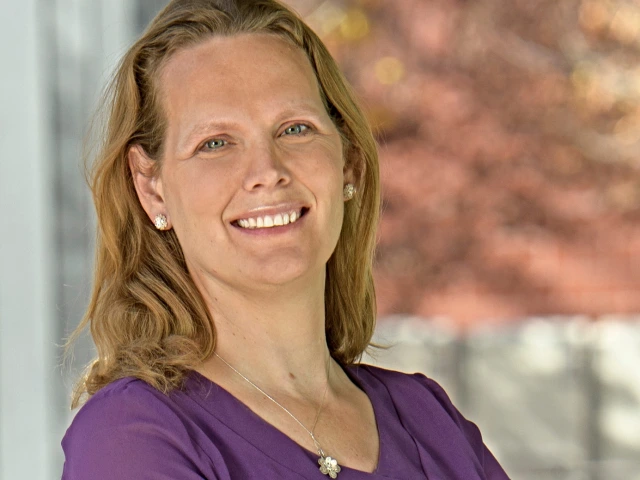 A headshot of Kacey Ernst.