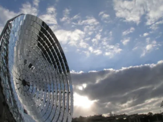 A solar panel under a blue sky.