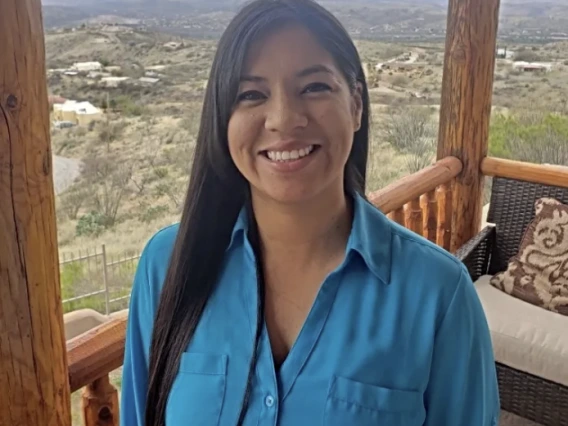 A headshot of Denisse Ortega Lorona.