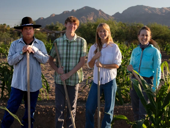 Assistant professor Michael Kotutwa Johnson, with students Dennis Kay Nichols, Greta Marie Cotraccia, Emily C. Rockey.