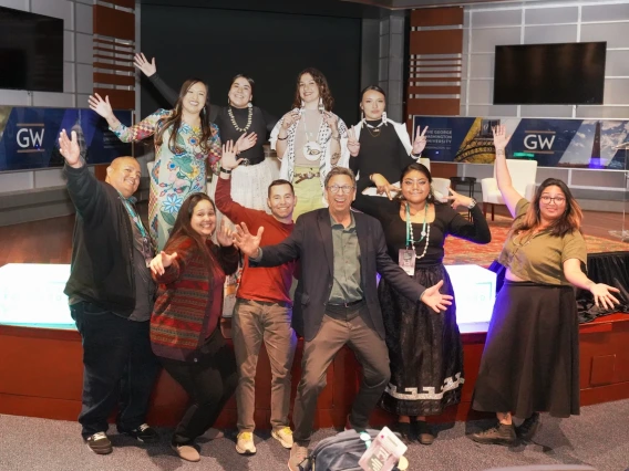 Students pose together in celebration at the 2025 Planet Forward Summit.