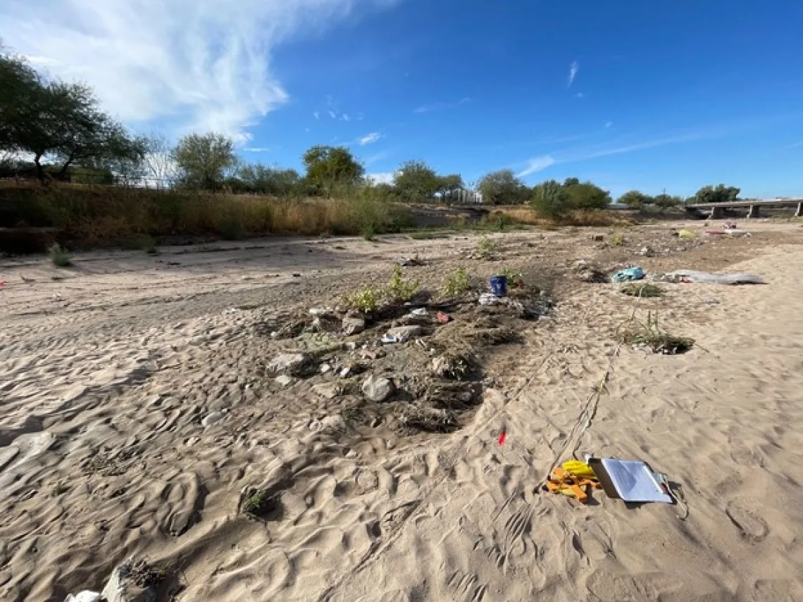 Photo of trash found in river bed.