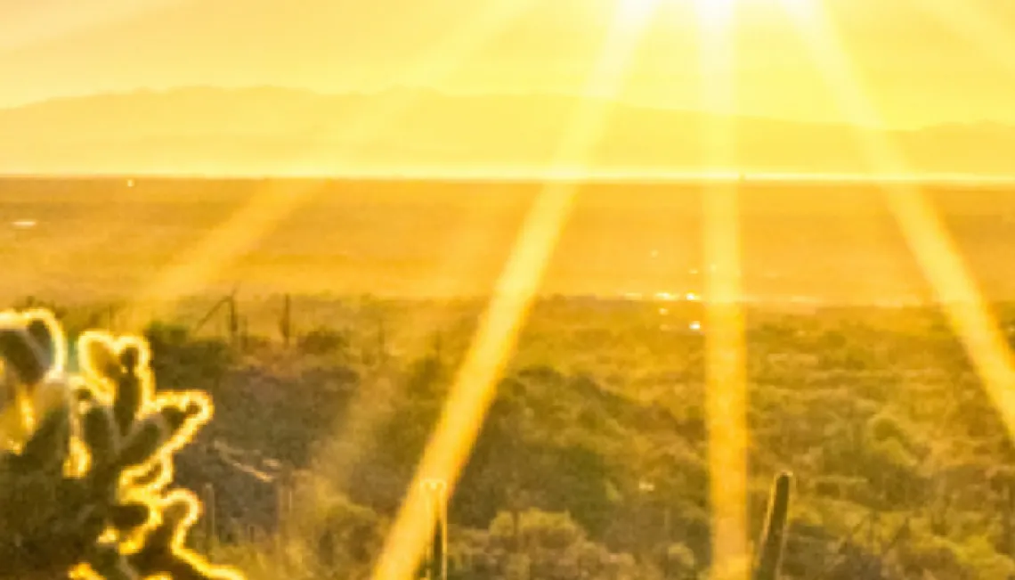 A sunrise over the Rincon Mountains as seen from Tumamoc Hill.