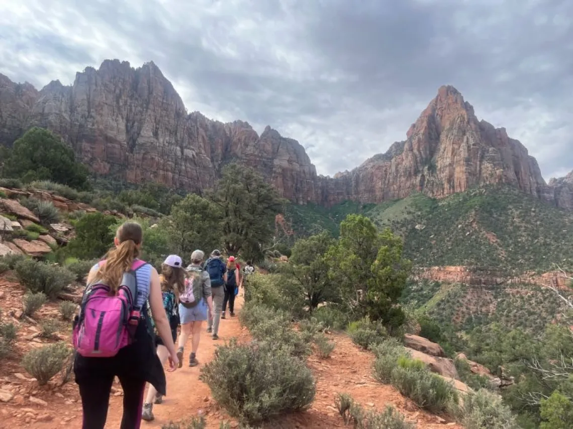 Hikers hiking the Watchman trail.