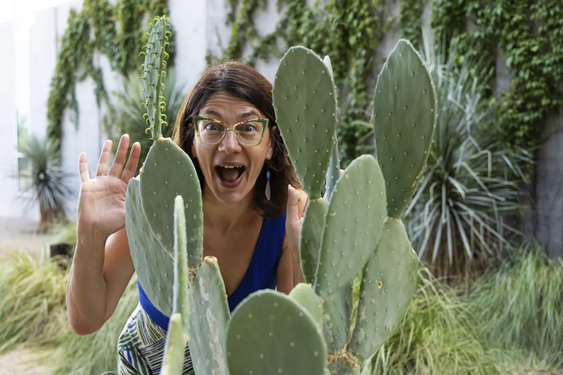 A headshot of Elise Gornish with a prickly pear cactus.