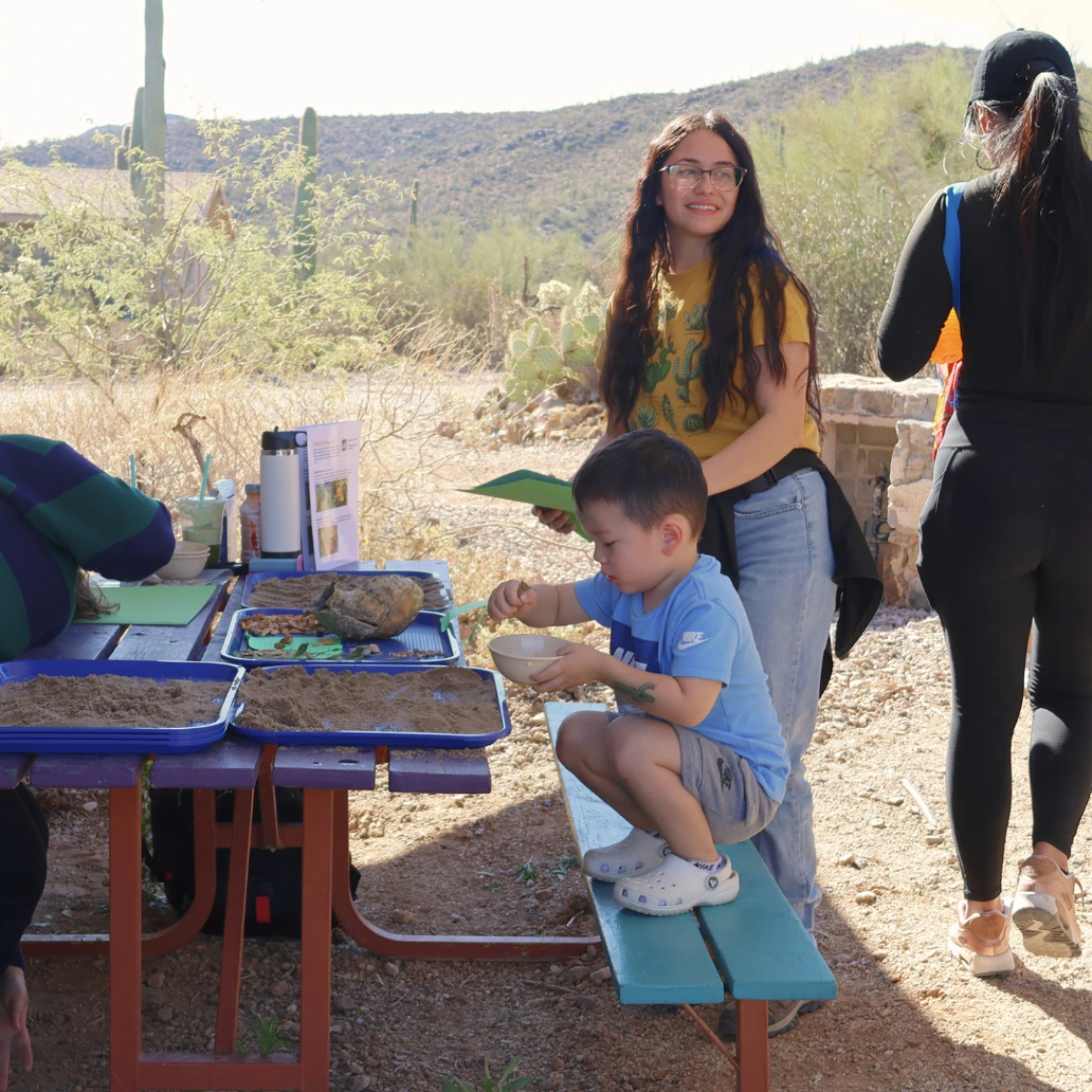 Child and woman participating in Cooper Center activity