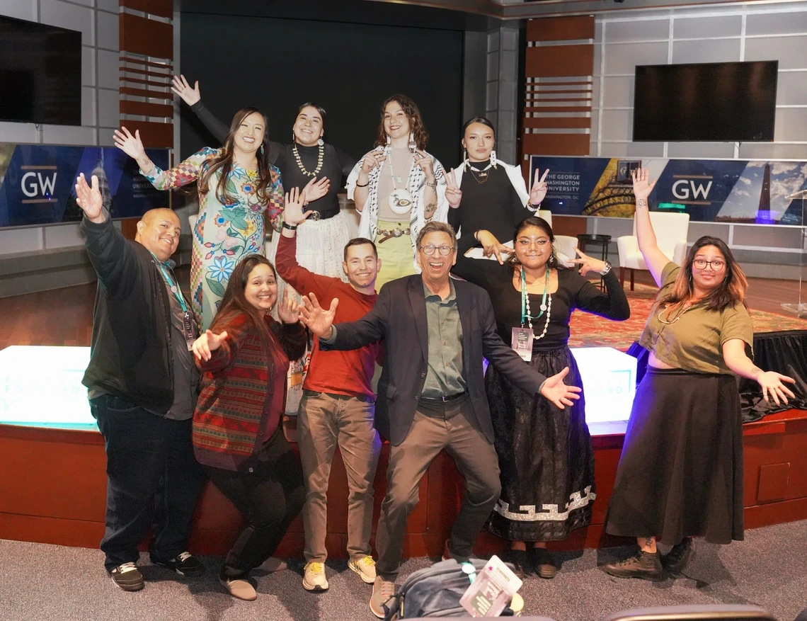 Students pose together in celebration at the 2025 Planet Forward Summit.