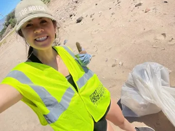 Selfie taken by Jamie Irby while helping clean up trash in river bed