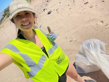 Selfie taken by Jamie Irby while helping clean up trash in river bed