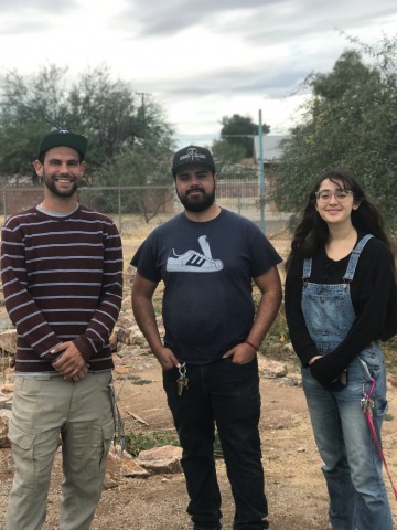 Farm managers Brandon Alexander and Jacob Robles and Earth Grant student Paloma Martinez at a farm.