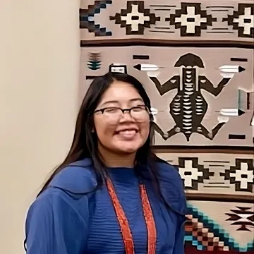 Smiling student with glasses