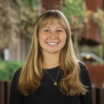 Smiling student with blonde hair 