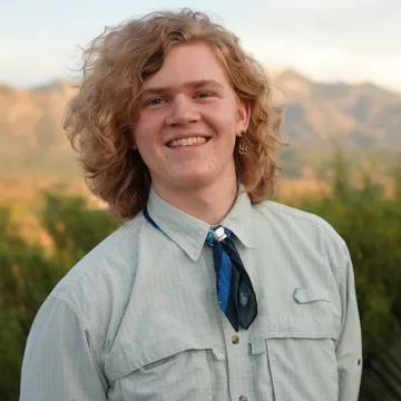 Smiling student with long blonde hair