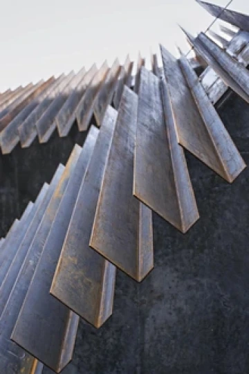 Steel rails of building siding