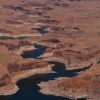 A ring marks the receded shoreline at Lake Powell, a Colorado River reservoir on the Utah-Arizona border that is now 24% full. A record-low snowpack across the Colorado River Basin is heightening concerns as drought conditions in the Southwest worsen.