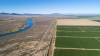 The Colorado River winding past farmland.
